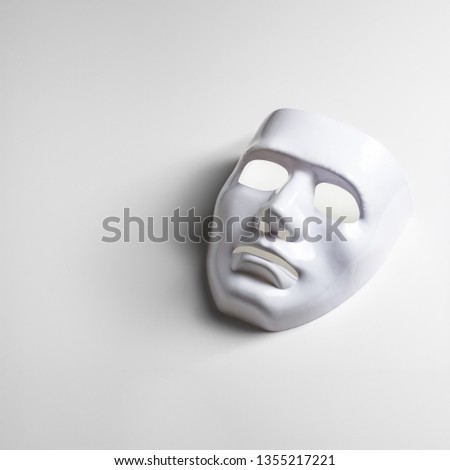 White mask on white background