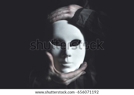white mask theatrical concept