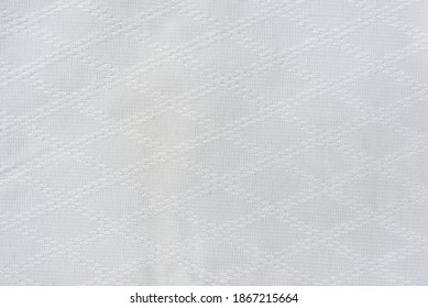 White material of a suit for practicing martial arts Judo and Aikido. Background image.