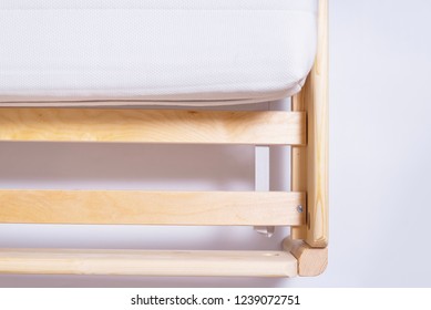 White Mattress On Wooden Bed Frame