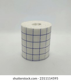 White medical adhesive tape plaster bandage stand position isolated on white background

