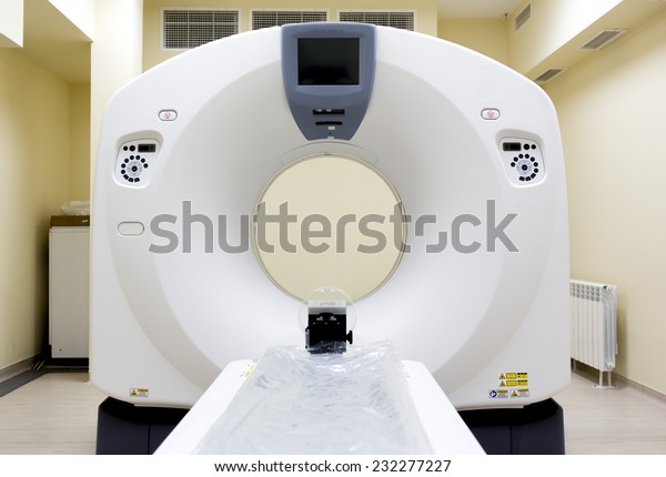 White medical CT scanner
in a clinic.