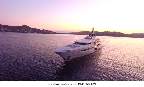 White Mega Yacht At Sunset