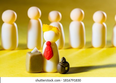 White Men Yellow Background. Men Symbolize US Republican Party. Figures From Plasticine. Republican Presidential Candidate In Foreground. US President And Ballot Box. Democrats Rivals During Voting.