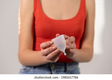 White Menstrual Cup For Women's Health. Horizontal Photo.