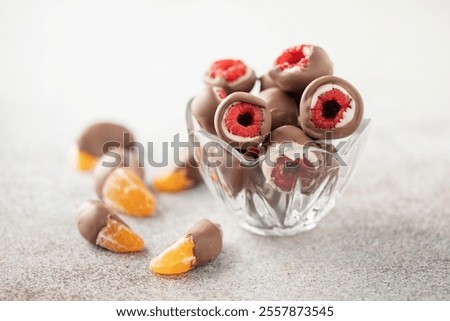 White and milk chocolate glazed raspberry candy