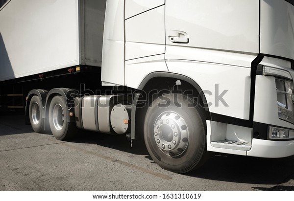 White modern truck parking, Road freight industry\
transport 