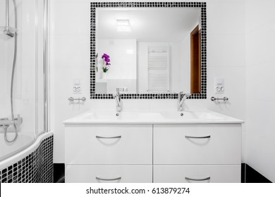 White, Modern Villa Bathroom With Basin Cabinet, Mirror And Bathtub