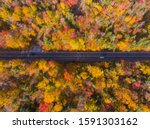 White Mountain National Forest fall foliage on Kancamagus Highway top view near Sugar Hill Scenic Vista, Town of Lincoln, New Hampshire NH, USA.