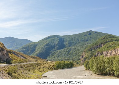 White Mountain River In Altai. Summer View Of Altai, Russia. Altai Republic Is One Of Russia's Ethnic Republics. Altay