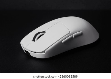White mouse computer gaming closeup on black background