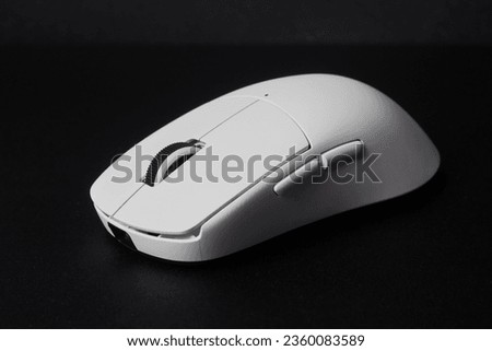 White mouse computer gaming closeup on black background