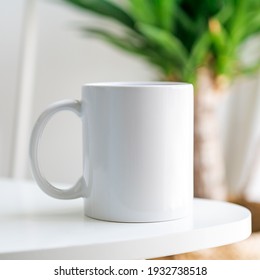 White Mug with copy space on front in lifestyle setting