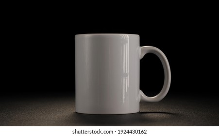 White Mug On Black Background.