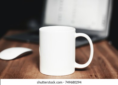 White Mug On The Wooden Table