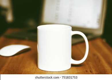 White mug on the wooden table - Shutterstock ID 751831753