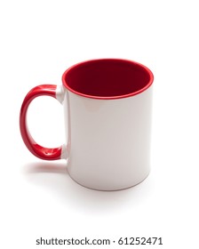 White Mug With Red Handle Isolated On White Background