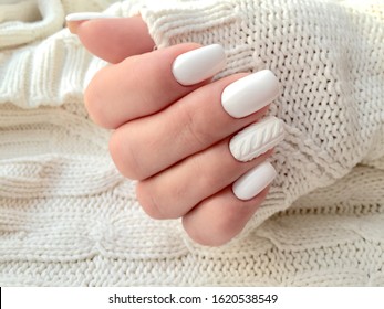 white nails winter manicure sweater on nails