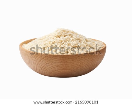 white natural basmati rice in a wooden bowl  isolated on white background.