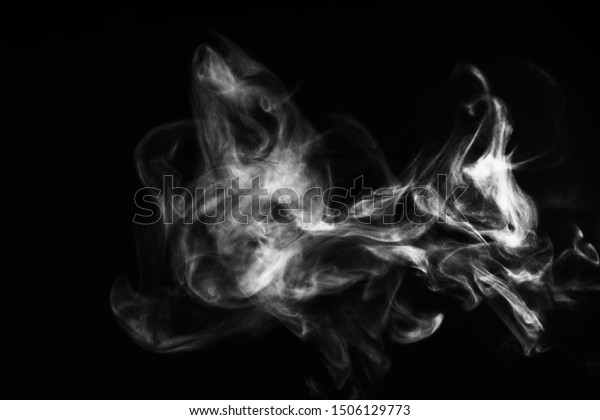 White natural steam smoke effect on solid black
background with abstract blur motion wave swirl use for overlay in
pollution, vapor cigarette, gas, dry ice, warm hot food, boil water
smoke concepts
