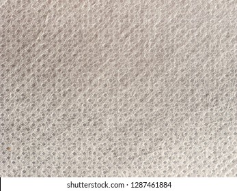 white nonwoven polypropylene fabric texture useful as a background