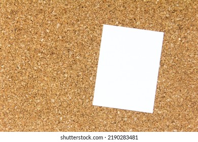 White Note Paper Place On Corkboard Background With Copy Space