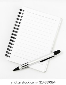 white notebook isolated - Shutterstock ID 314839364