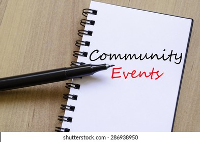 White Notepad And Ink Pen On The Wooden Desk Community Events Concept