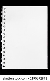 White notepad for notes lies on a black background