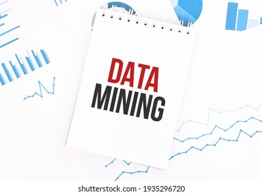 White Notepad With Text DATA MINING On The Financial Documentation. Finance And Business Concept