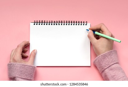 White Notepad for writing on pink background. - Shutterstock ID 1284535846