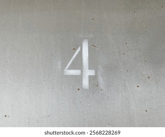 White number 4 on aged gray background. Four on textured surface - Powered by Shutterstock - Get 15% off with code: PIKWIZARD15