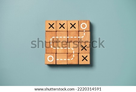 White O with dot path on wooden block cube for business strategic planing and sport tactic to achieve goal and target concept.