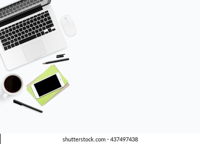 White Office Desk Table With Laptop, Smartphone, Cup Of Coffee And Supplies. Top View With Copy Space, Flat Lay.