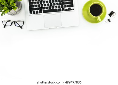 White Office Desk Table With Laptop, Coffee And Supplies. Top View With Copy Space, Flat Lay.