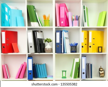White office shelves with different stationery, close up - Shutterstock ID 135505382