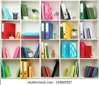 White Office Shelves With Different Stationery, Close Up