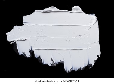 White Oil Paint Isolated On A Black Background