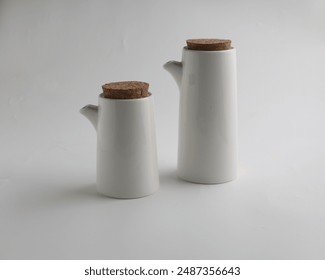 White oil or vinegar dispenser with wooden corks stopper, isolated on white background - Powered by Shutterstock