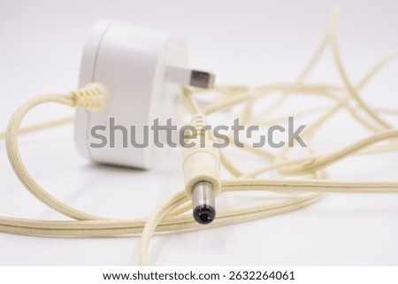 White old ACDC adaptor plug