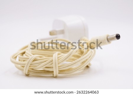 White old ACDC adaptor plug