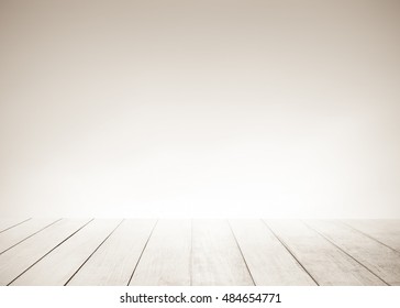 White Old Wood Floor With Blurred Brown Sepia Tone Background. Wooden Planks Stage Texture And Blur Flare Sunlight. Abstract Medical Backdrop. Focus To Table Top In The Foreground.