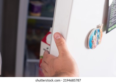 White Open Fridge Door With Food Inside