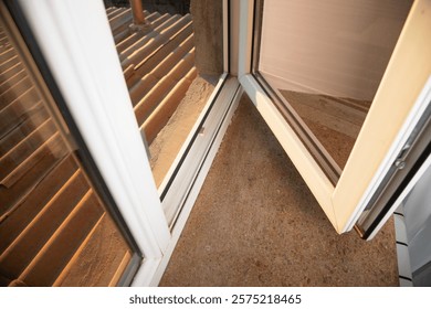 White opened plastic pvc window at home.