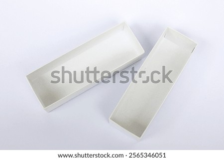 White opened rectangular box isolated on background.