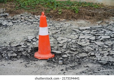 White Orange Traffic Hazard Cone On Asphalt Road Repair,Thailand