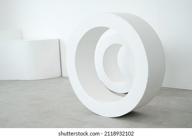 White Ornament Circles In A White Room.