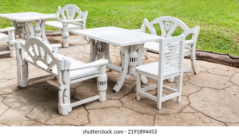 White Outdoor Wooden Chair And Table Retro Style At Lawn Coffee Shop