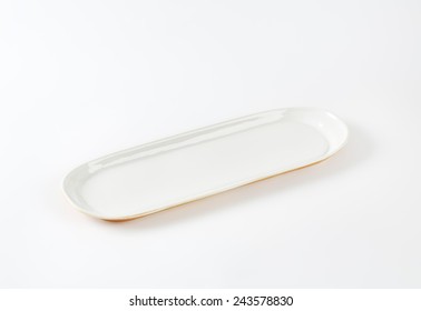 White Oval Plate On White Background