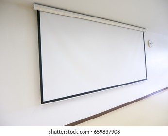 A White Overhead Projector On Ceiling Indoors